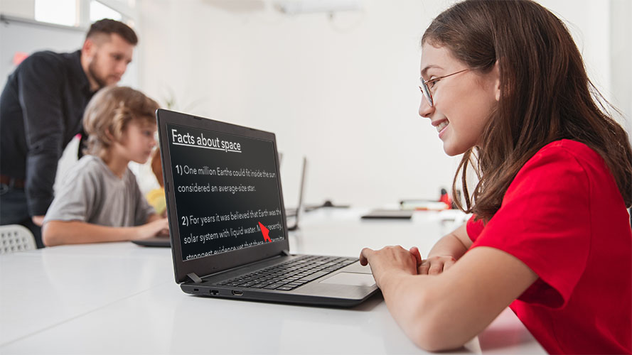 Student using SuperNova on a laptop in class